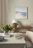 Amaya Weave Table Lamp Natural styled on console with coastal artwork