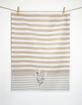 Country Alpine Daisy Tea Towel hanging on clothes line