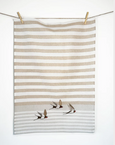 Country Swallow Tea Towel hanging on clothes line