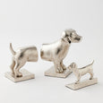 Silver dachshund-shaped aluminium bookends, set of 2, measuring 20x18.5x9cm.