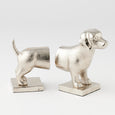 Silver dachshund-shaped aluminium bookends, set of 2, measuring 20x18.5x9cm.