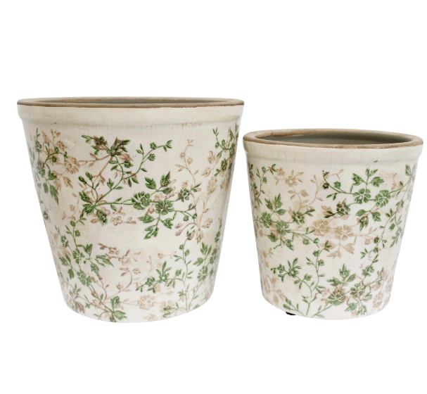 Set of two ceramic planters with vintage floral print in neutral tones, rustic handcrafted finish, and drainage holes.