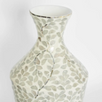 White sculptural Autumn Vase Small made from paper powder and capiz, measuring 25x25x50cm.