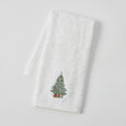white cotton hand towel with embroidered a Christmas tree motif.