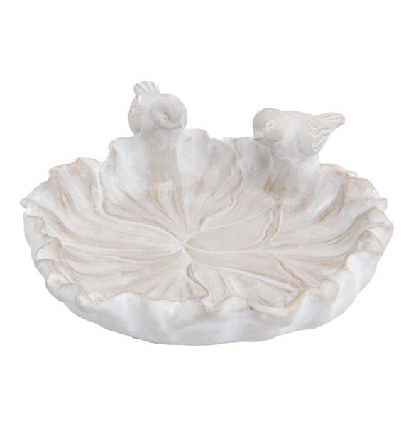 Small cement bird bath with embossed flower design and two perched bird figures, 23x23x8cm.