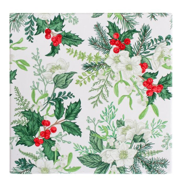 Square ceramic trivet with cork backing, featuring a vintage-style botanical print of holly leaves, pine sprigs, white flowers, and red berries.