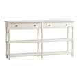 White Portico Console with bamboo-inspired accents, two drawers with brass pulls, and two lower shelves in an elegant coastal style design.