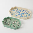 Cream decorative tray with blue songbird and floral illustration, rectangular with curved edges and side handles.