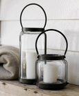 Cabin Lantern Tall sitting with Cabin Lantern short