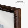 Designer Boys Bamboo Brown picture frame featuring a sculpted bamboo design in a rich brown timber finish, 23mm wide by 32mm deep.