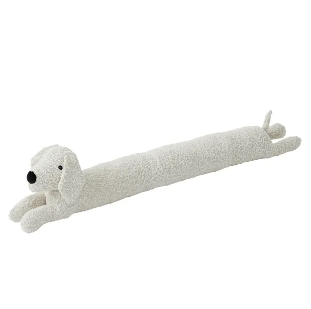 Ivory bouclé dog-shaped door stop with long body design, used as a decorative draft stopper for doors or windows.