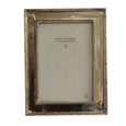 Beaded nickel photo frame in antiqued silver holding a 4x6 image