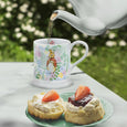 Beatrix Potter 9.3cm Flopsy Mug on an afternoon tea table with scones 