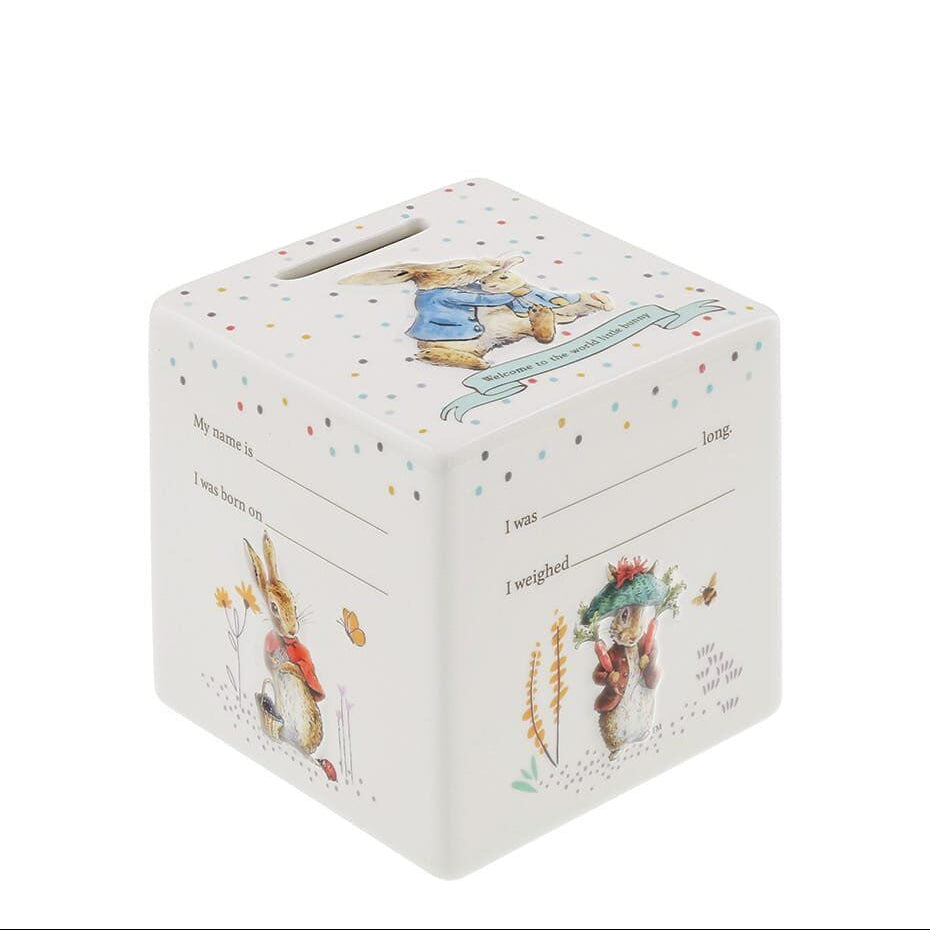 Beatrix Potter Peter Rabbit ceramic baby money bank with milestone details, perfect for new baby or christening gift