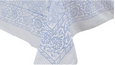 Belvedere Blue tablecloth in hand block printed cotton with blue floral pattern and striped border on a Hamptons-style dining table