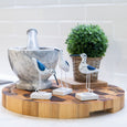 Set of three navy and white decorative coastal birds on white bases, perfect for Hamptons-style home décor.