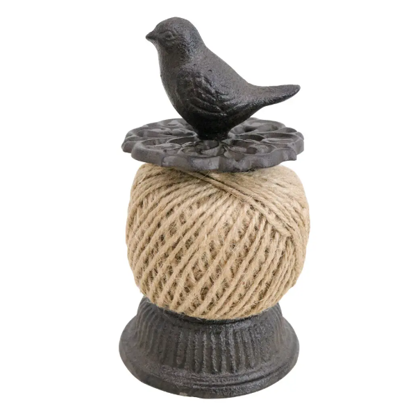 Cast iron bird string holder with natural jute twine in medium size.