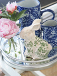 Blossom blue and white porcelain jug styled on a tray with flowers and decorative accents