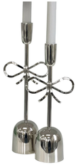 Nickel bow candlestick medium with polished silver finish, shown on a white background