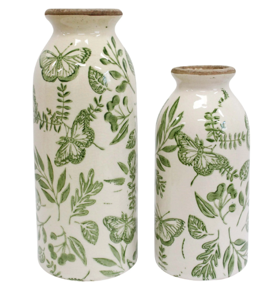 Set of 2 ceramic bud vases with green butterfly and foliage design on an off-white base, in large (20cm) and small (15.5cm) sizes.