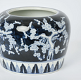 Cherry Blossom Planter Small – ceramic planter with white cherry blossoms on navy-blue background, 27 cm diameter.