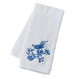 White cotton hand towel with blue embroidered Chinoiserie bird and floral design.