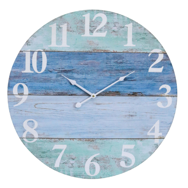 Blue and seafoam shoreline wall clock with white numerals and weathered timber look styled in a Hamptons-style interior
