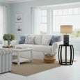 Condetti blue table lamp styled on a side table in a Hamptons-style living room with coastal furnishings