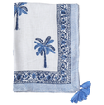 Blue and white hand block printed cotton throw with palm motif and tassel detail styled in a coastal Hamptons-style interior