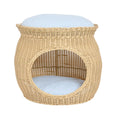 Cove natural rattan pet bed with open front and striped cushion