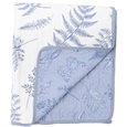 A reversible, quilted cotton coverlet with a blue and white botanical print of ferns and butterflies. One side is a white background with a blue print, and the reverse is a solid light blue with a white print.