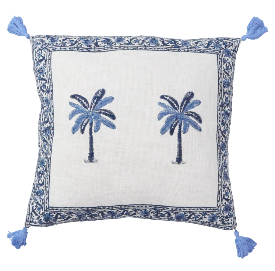 Blue and white hand block printed cotton cushion with palm motif and tassel corners styled in a coastal Hamptons-style interior