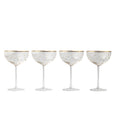 Set of four coupe glasses with raised gold dots and gold rim, elegant glassware for champagne and cocktails.
