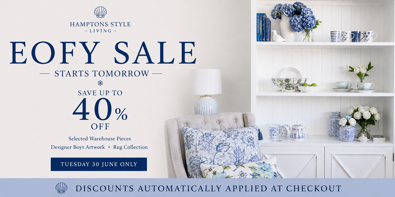 Advertisement for a sale event with decorative items in a living room setting.