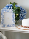 Coastal ceramic 5x7 photo frame with blue palm print styled with hydrangeas