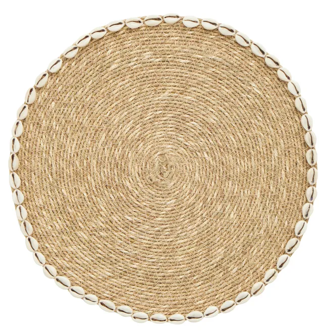 Round natural seagrass placemat with white shell border.
