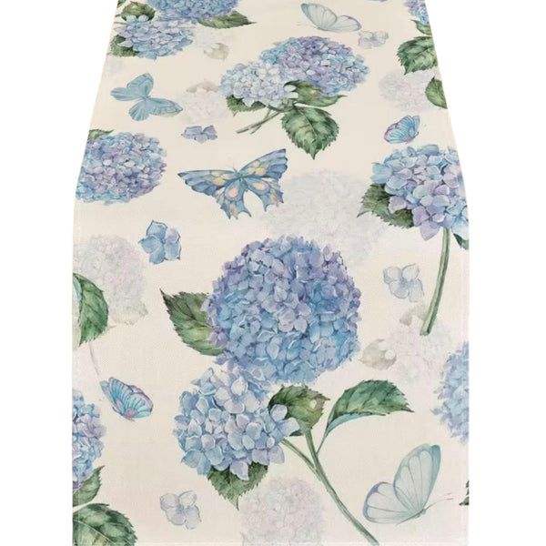 Hydrangea Butterfly Table Runner featuring blue hydrangea blooms and delicate butterfly motifs on a linen background for coastal table styling