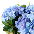 Hydrangea Nite Berry Classic Bowl Blue with lifelike blue hydrangeas, white berries and foliage arranged in a glass bowl with faux water.