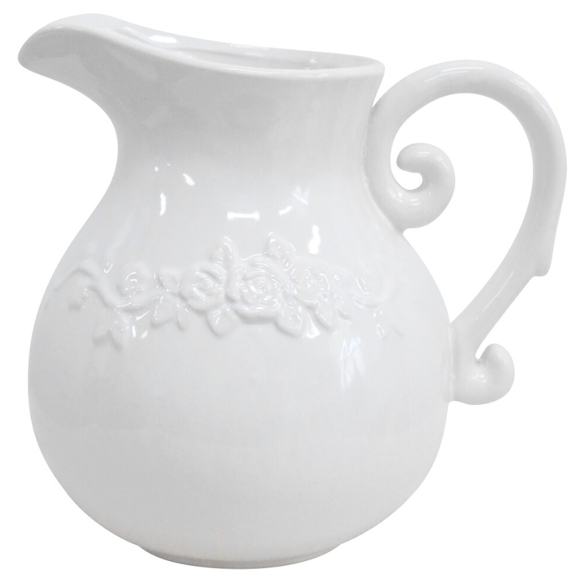 A glossy white ceramic pitcher or jug with a round belly and a wide handle. It features a raised, unpainted floral design (roses and leaves) embossed horizontally around the centre of the body.