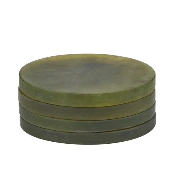 Pesto green resin coasters with a soft marbled finish, stacked in a set of four