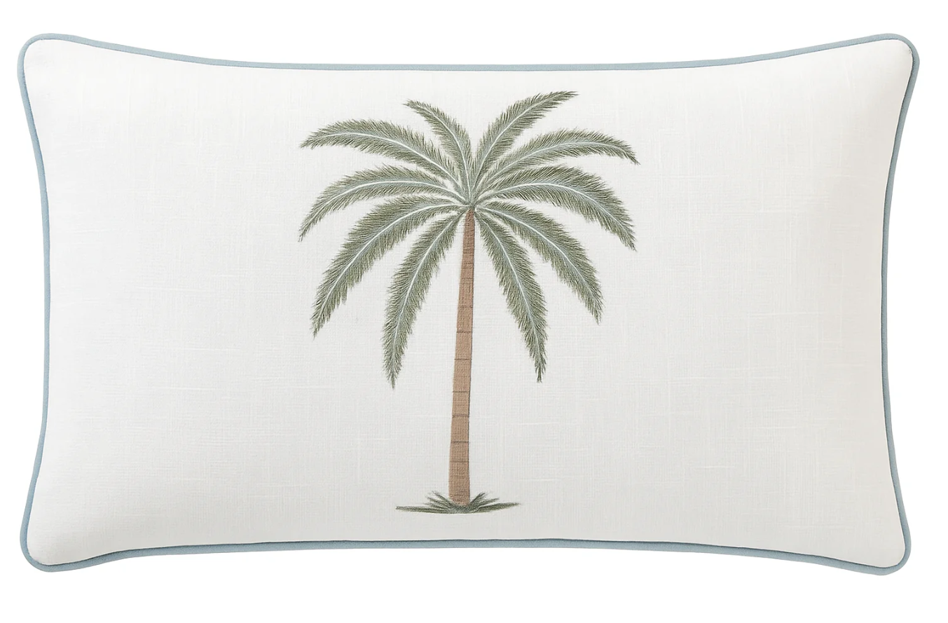 Laguna Palm Dune cushion with embroidered green palm tree motif and soft piped edge, 50x30cm