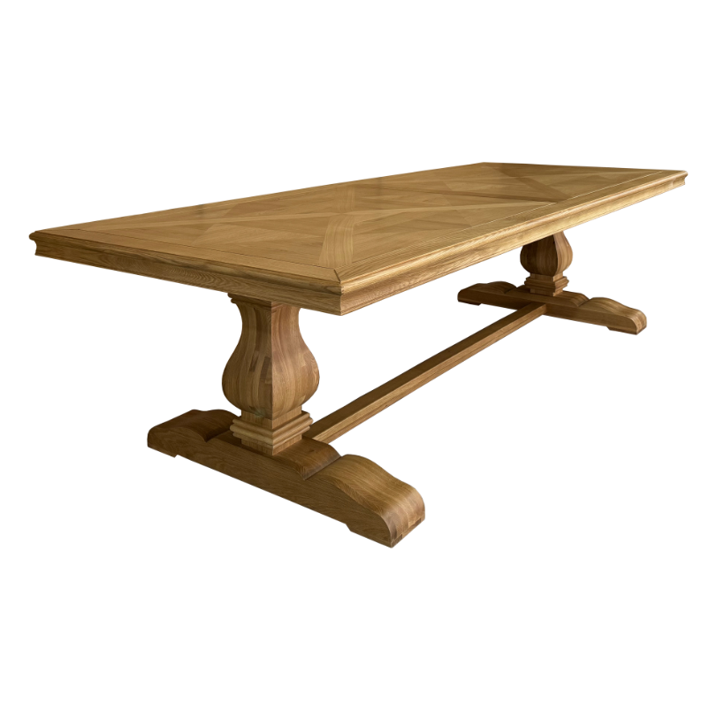 Large oak trestle dining table with parquet timber top and classic pedestal base in natural finish