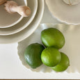 Realistic artificial green lime with textured finish for kitchen or dining table styling