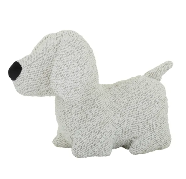Ivory bouclé dog-shaped door stop with soft texture and weighted design, ideal for keeping doors open in Hamptons or coastal-style interiors.