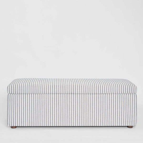 Newport Storage Ottoman upholstered in white and blue pin stripe fabric with timber feet