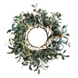 Large illuminated olive wreath with warm LED lights.
