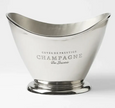 Polished silver oval champagne bucket with scoop front and engraved French motif, ideal for elegant entertaining and wine chilling.