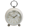Petite ivory alarm clock with classic round face and metal ring handle, small bedside clock