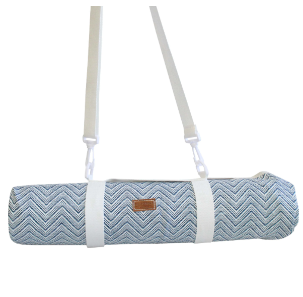 Foldable blue and white chevron picnic mat with white carry straps, rolled up for easy transport.