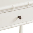 Portico bedside table in off-white with bamboo-style detailing, drawer and lower shelf